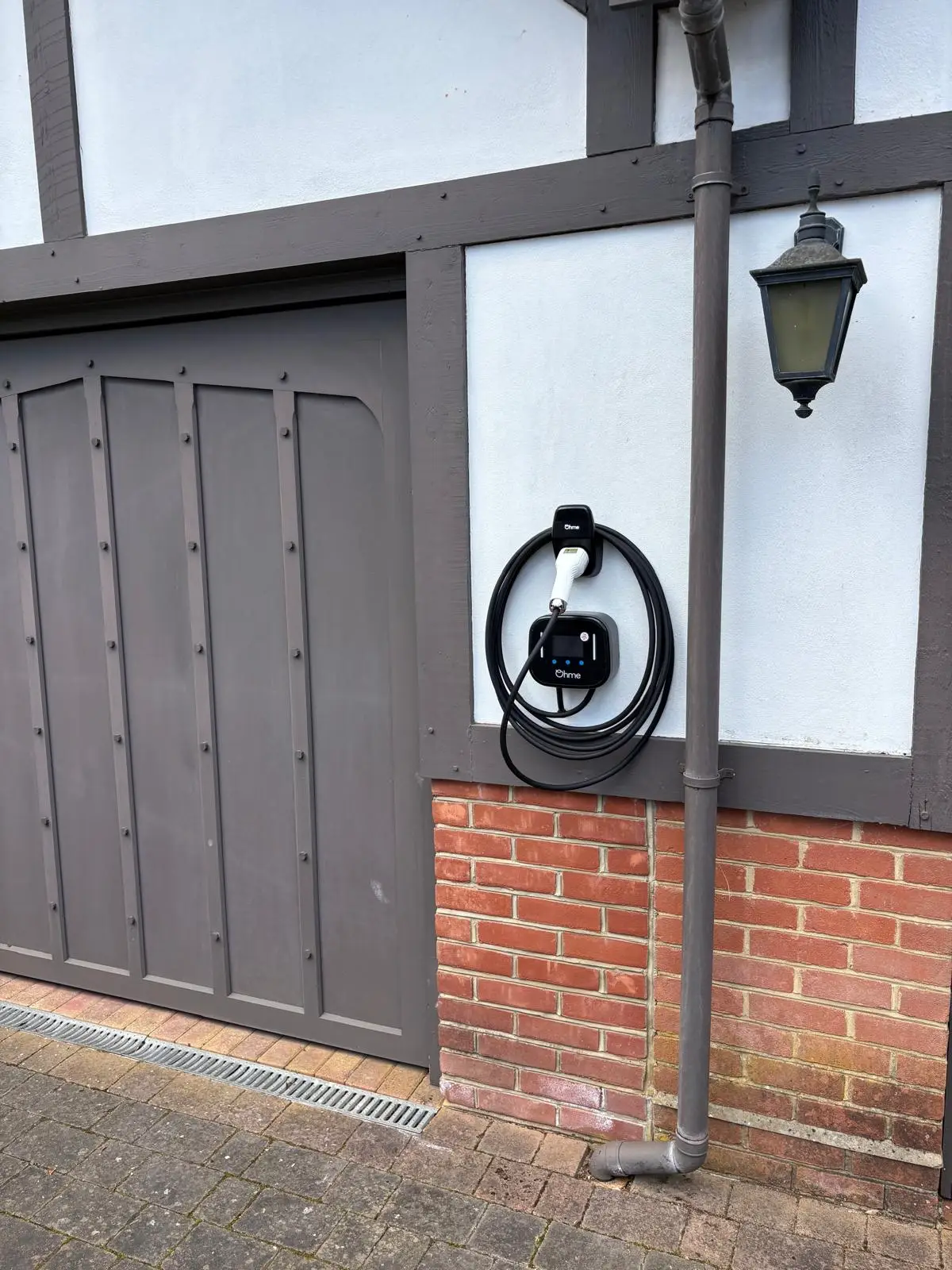Ohme Home Pro EV charger installed in Walton-on-Thames by Bring it Ohm Electrical Solutions
